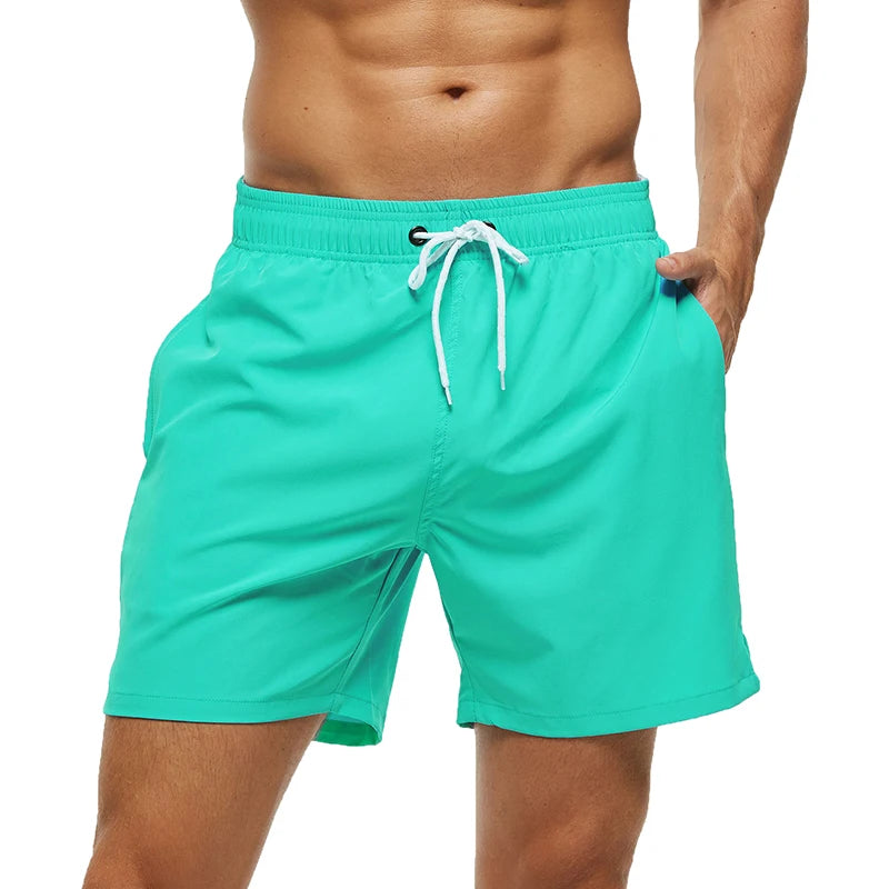 Escatch men’s quick dry swim trunks with zipper pockets and mesh lining in stylish beachwear design l green