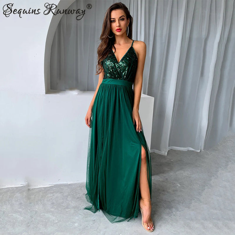 Woman wearing a green sequin dress with a white background