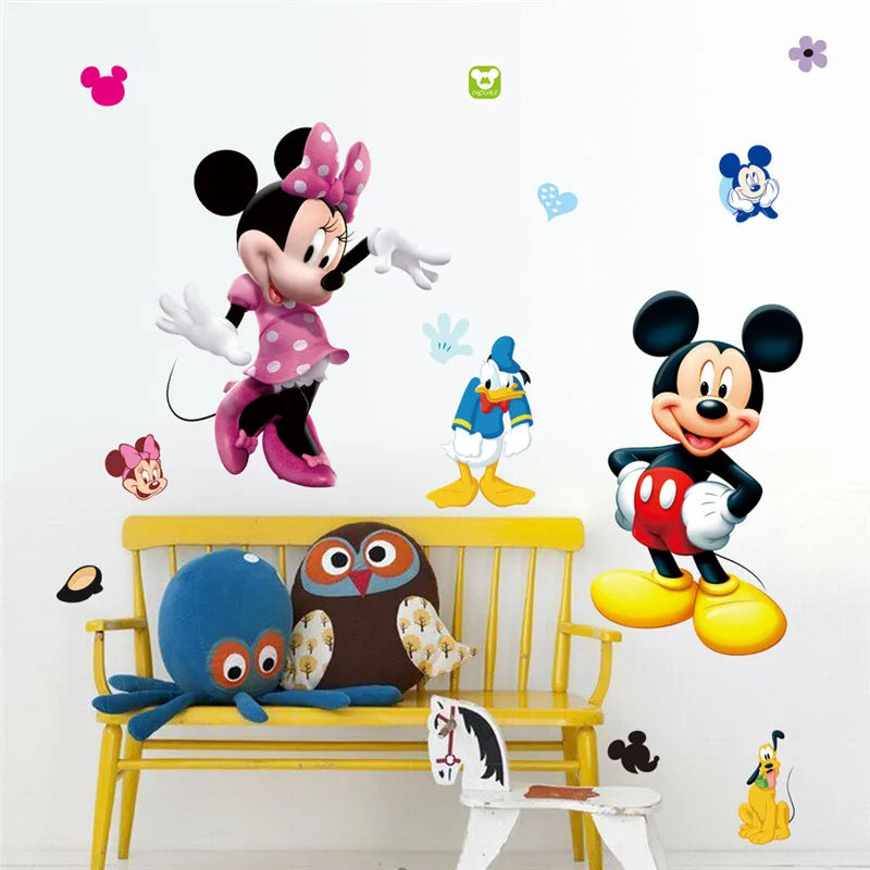 Cartoon character wall decals on a white wall with a yellow bench.