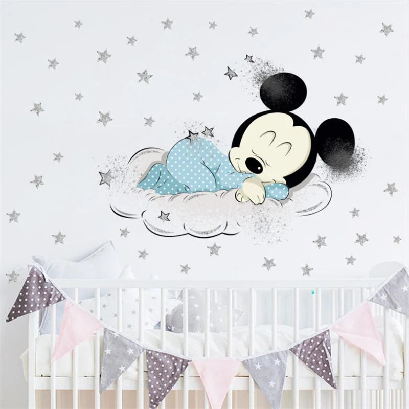 Crib with baby Mickey Mouse decoration and star-patterned wall