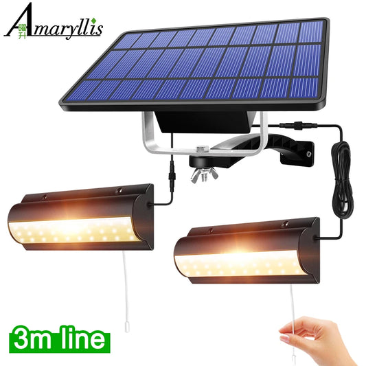 Two solar pendant lights with a shared solar panel, one with a 3m line for installation, and a hand demonstrating the scale of the lights.