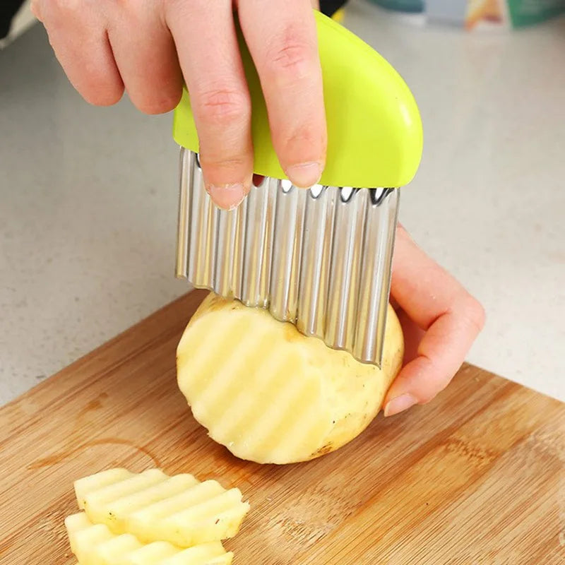 Stainless steel wavy potato cutter and French fry chopper kitchen tool for making crisp, uniform fries easily-green