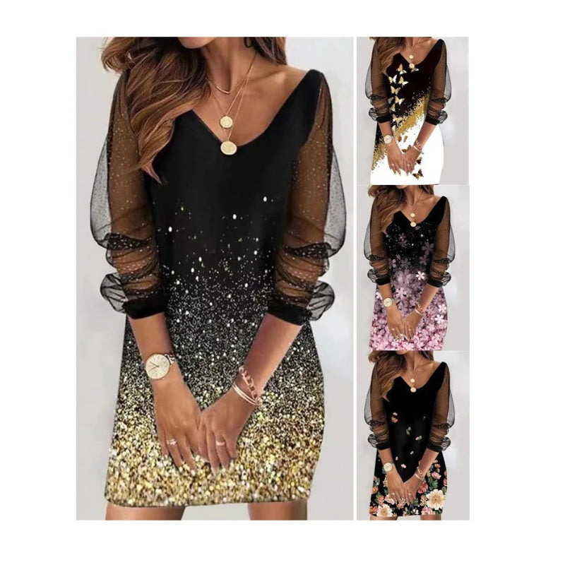 Black and gold dress with sheer sleeves and glittery skirt