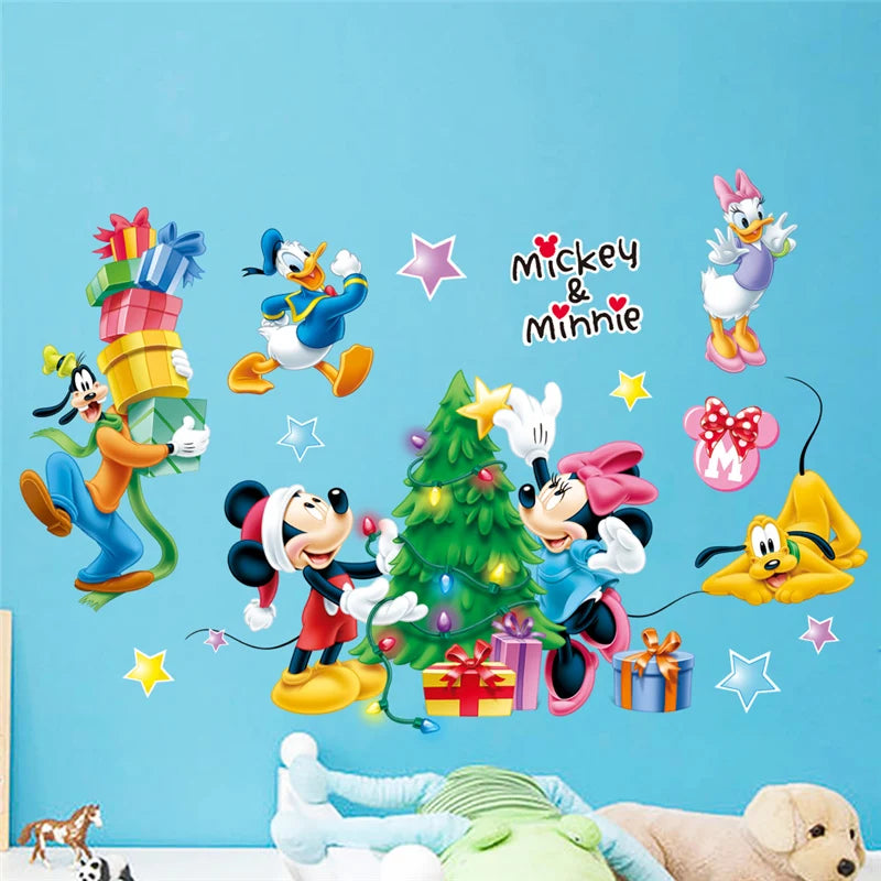 Cartoon characters around a Christmas tree on a blue wall.