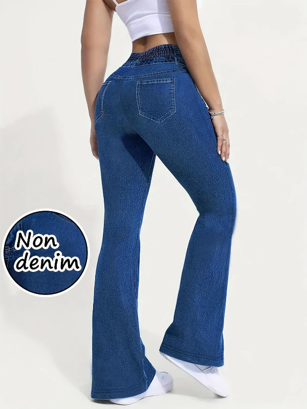 Person wearing blue jeans with a white background and 'Non denim' label.