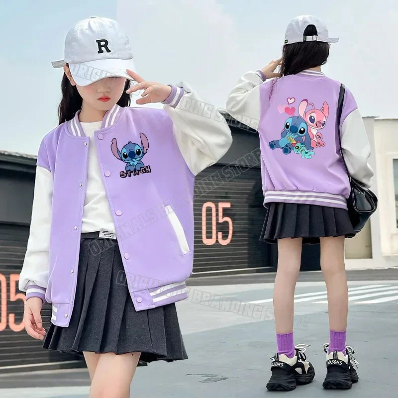 Two children wearing matching purple letterman jackets with cartoon character designs.