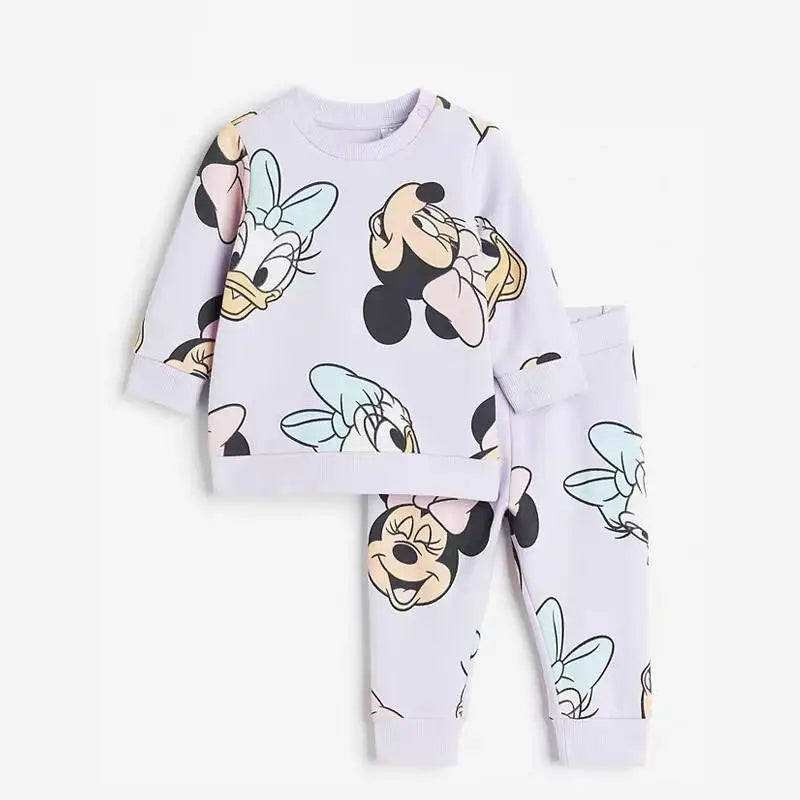 Children's pajama set with cartoon character design on a white background