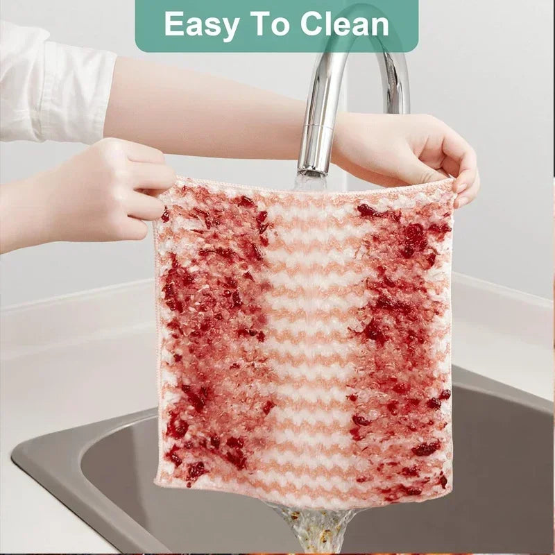 Person holding a red and white striped cloth under running water with 'Easy To Clean' text above.