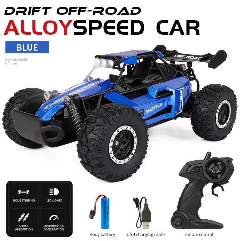 Blue alloy speed car with remote control and accessories on a white background