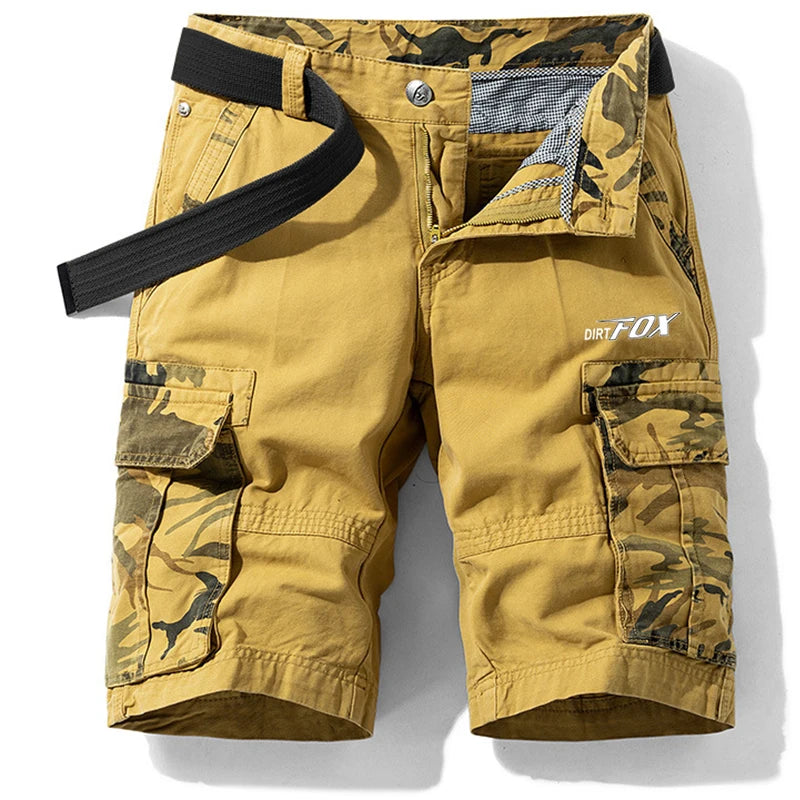 Yellow cargo shorts with camouflage patterns and a belt on a white background