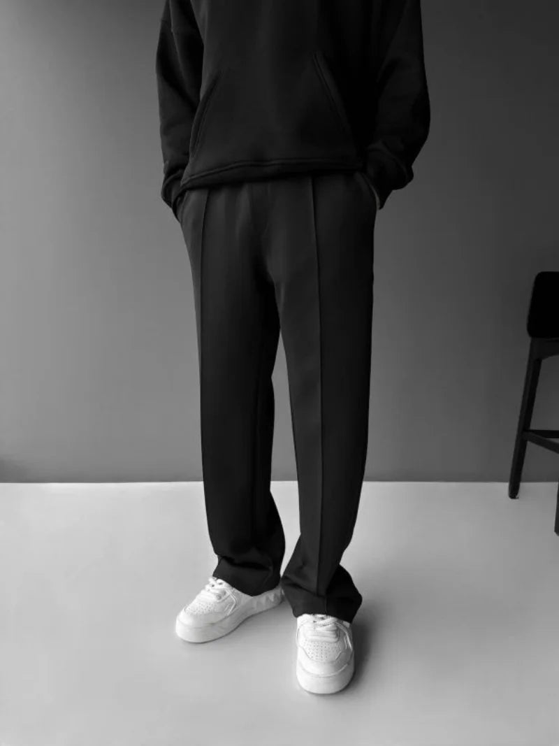 Men’s casual solid-color pants with elastic waist, drawstring closure, and side pockets black 2