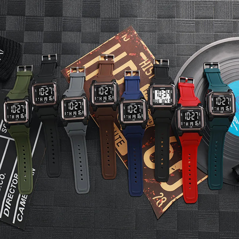 Digital wristwatches in various colors on a textured surface