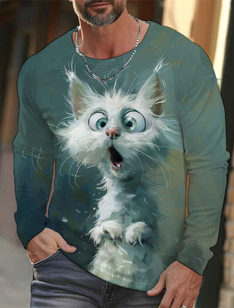Person wearing a long-sleeve shirt with a cartoon cat design on a blurred background