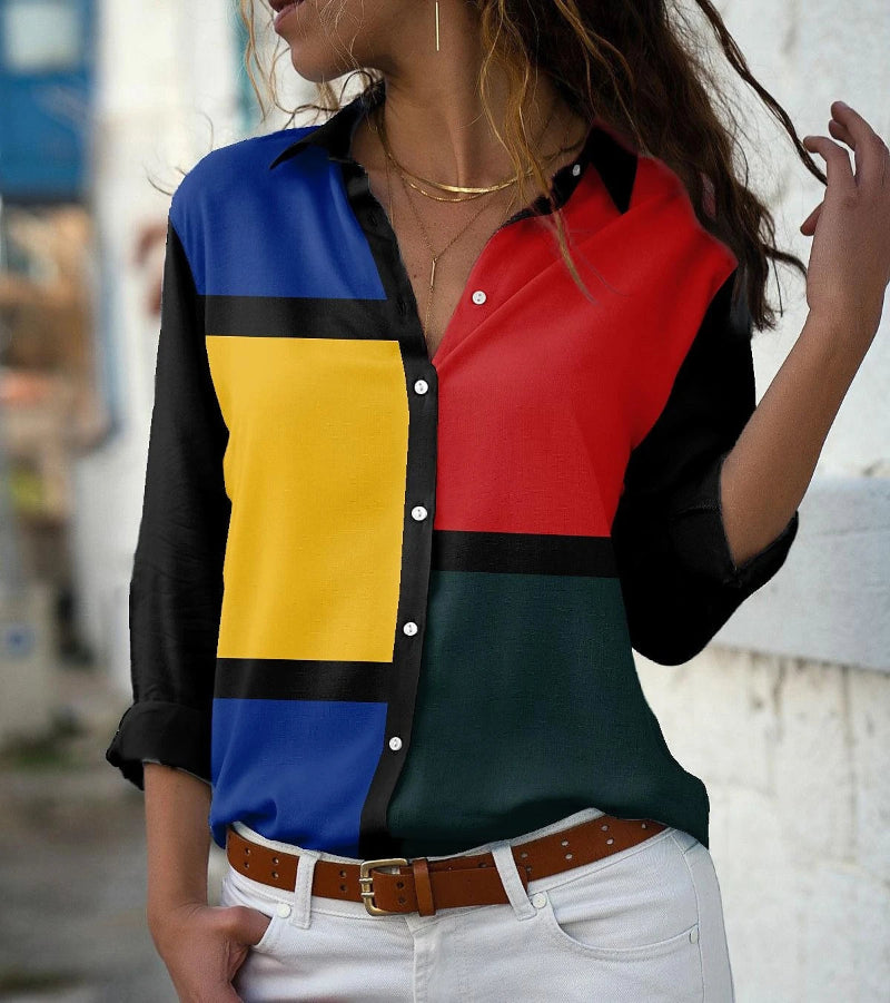 Colorful geometric-patterned shirt worn by a person with a blurred background