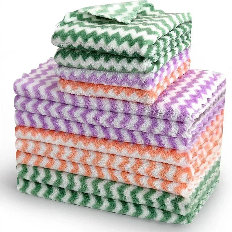 Stack of colorful chevron-patterned towels on a white background