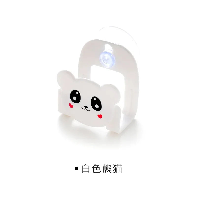 Cute panda-shaped device with a light on a white background