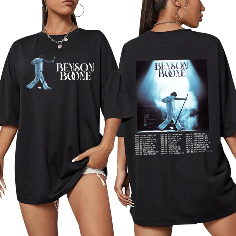 Black t-shirt with 'Benson Boone' graphic on front and back, worn by two models.