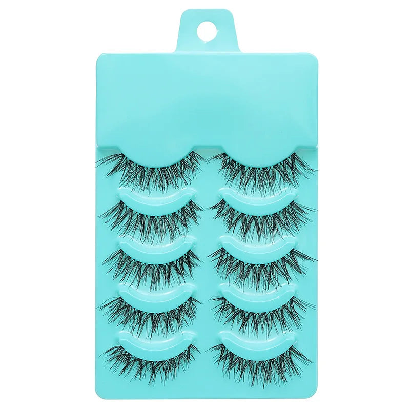 Set of false eyelashes on a turquoise card