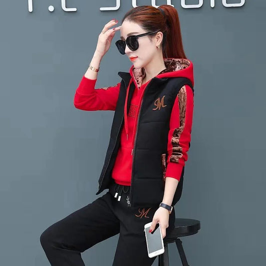 Woman wearing a red and black outfit with a logo on a gray background