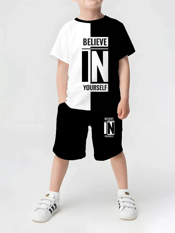 A child wearing a red and black outfit with a 3D crown print.