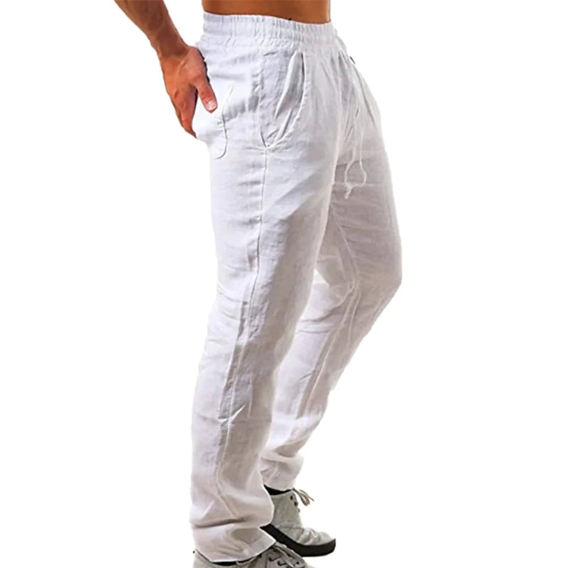 White pants worn by a person on a white background