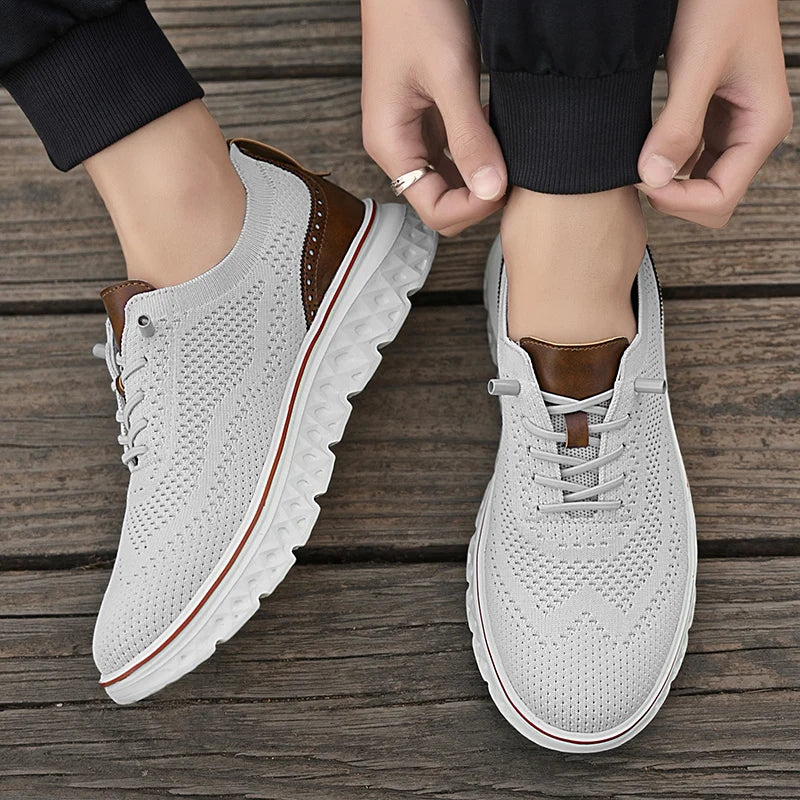 White sneakers with brown accents on a wooden floor