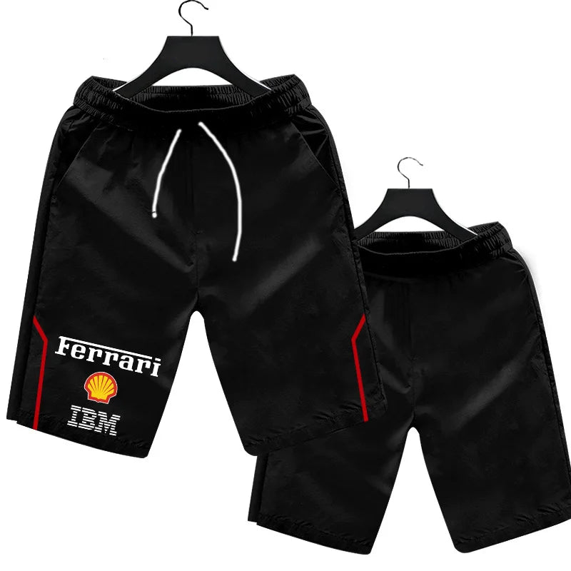 Black shorts with brand logos on a white background