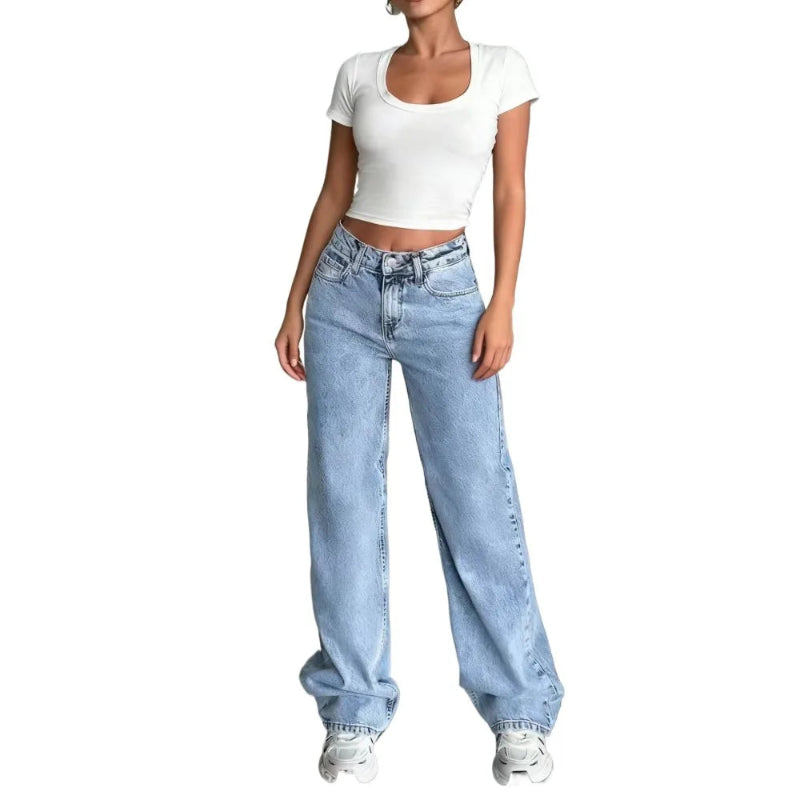 Person wearing light blue jeans and a white crop top on a white background