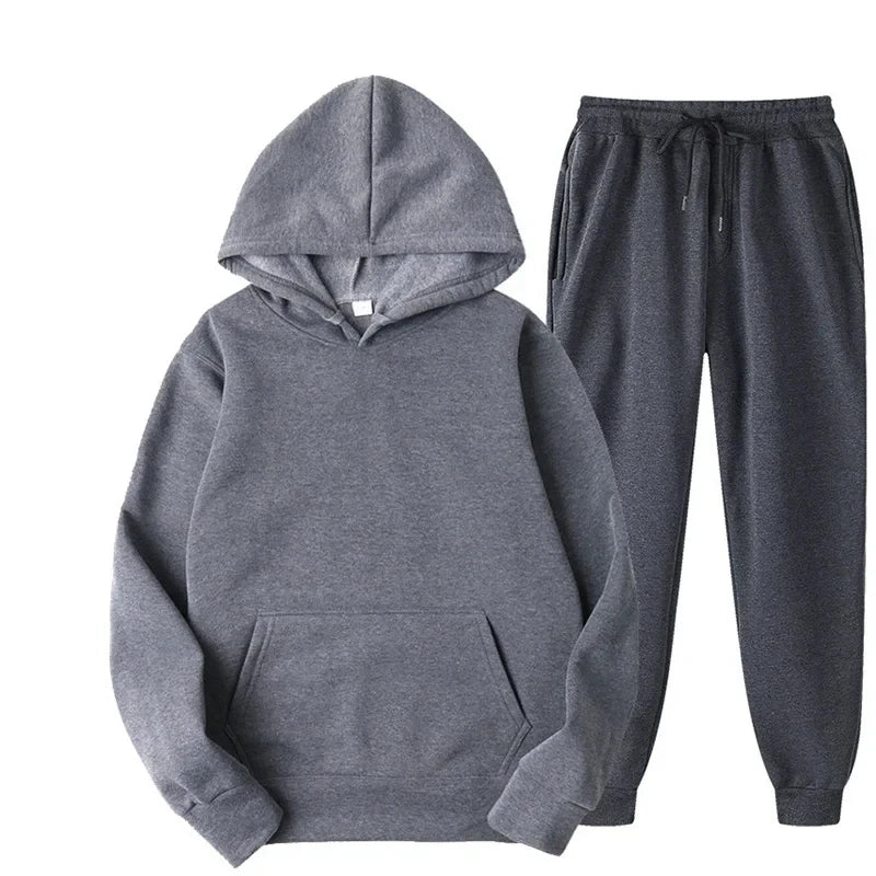 Gray hoodie and pants set on a white background