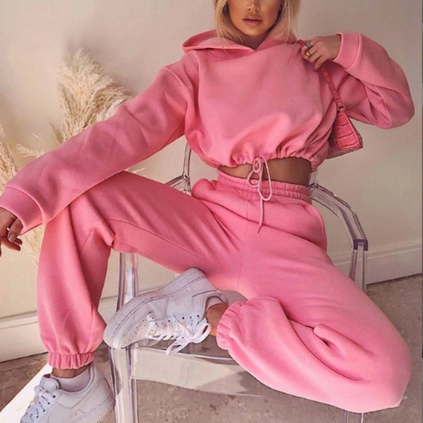 Women’s fashion two-piece sportswear set with long sleeves and high-waist casual pants in neutral tones pink