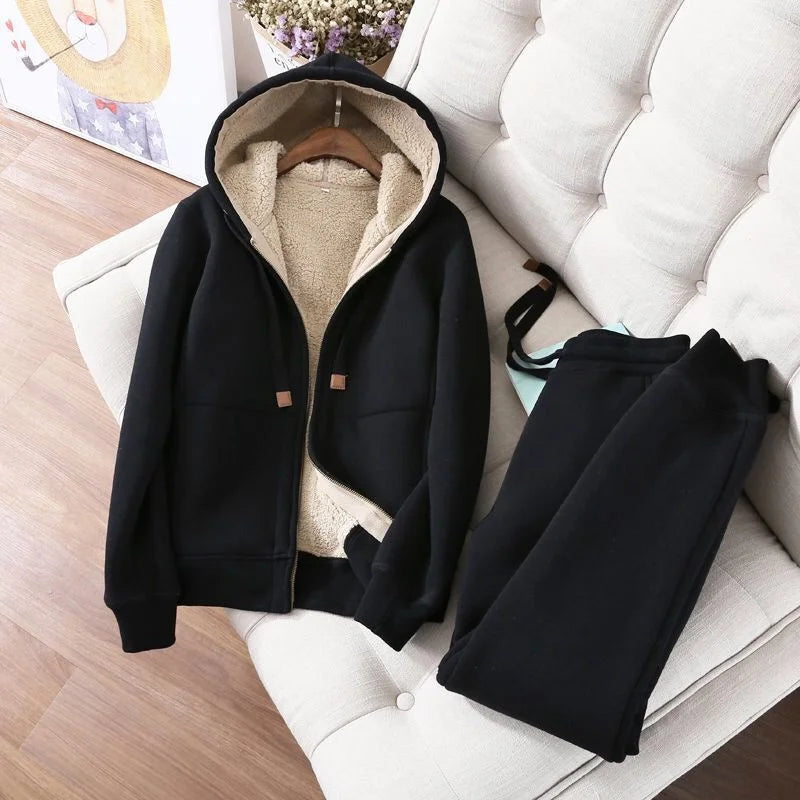 Black hoodie with beige lining on a white chair