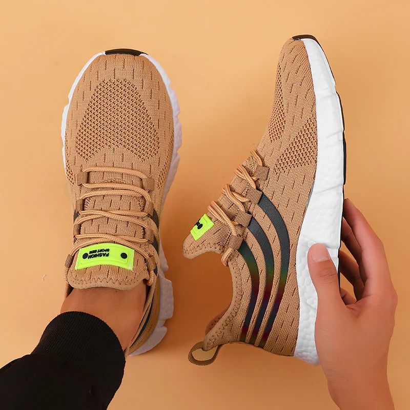 sneakers designed with breathable mesh and cushioned soles for all-day comfort in sports and casual wear. brown