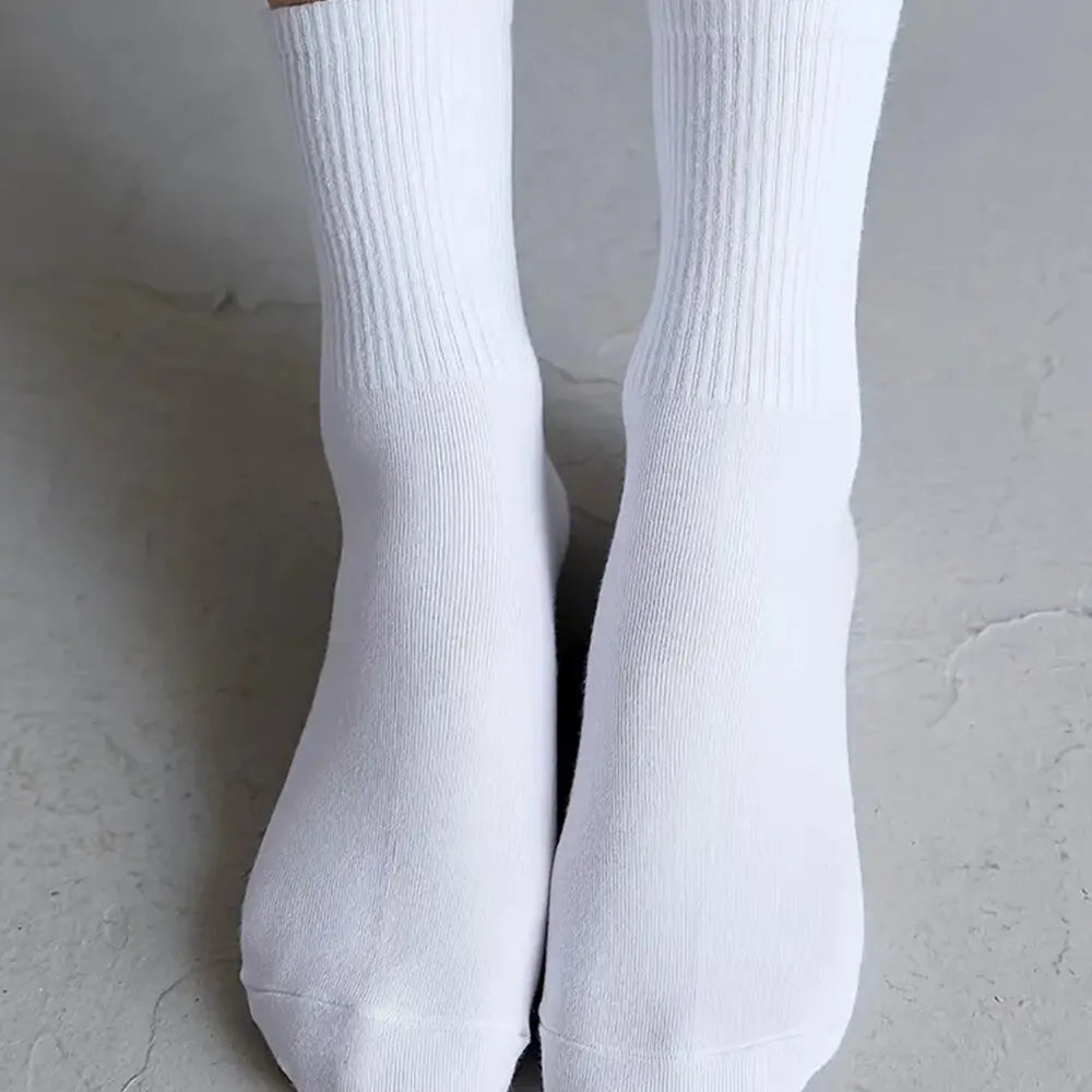 7 pairs of black and white mid-length breathable unisex socks for casual and sportswear - white