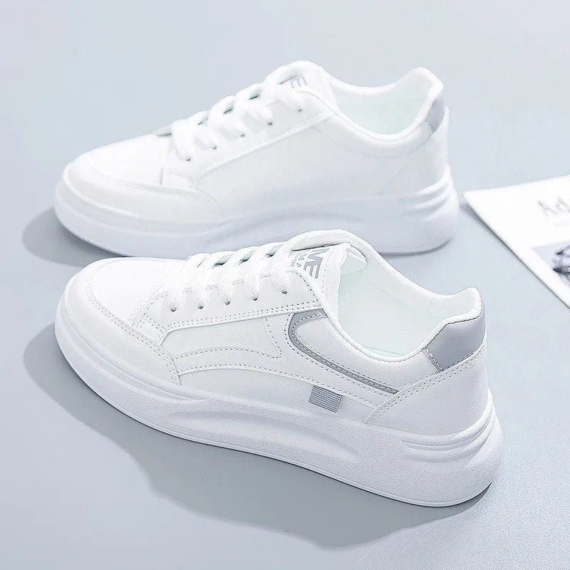 White sneakers on a light gray background