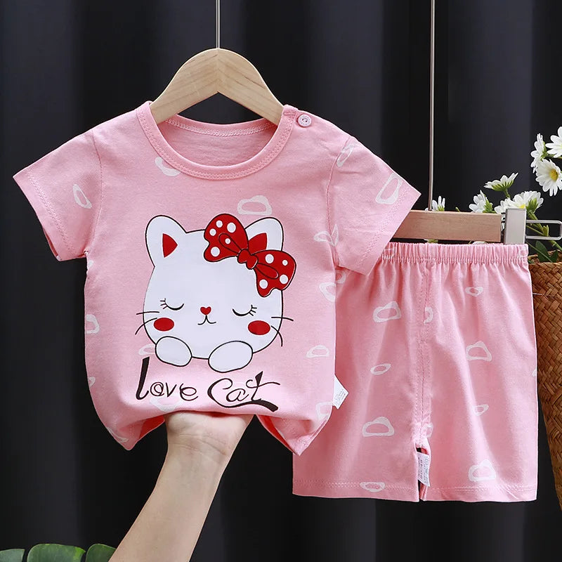 A soft and breathable baby girl pajama set, perfect for newborns and toddlers up to 3 years old 6