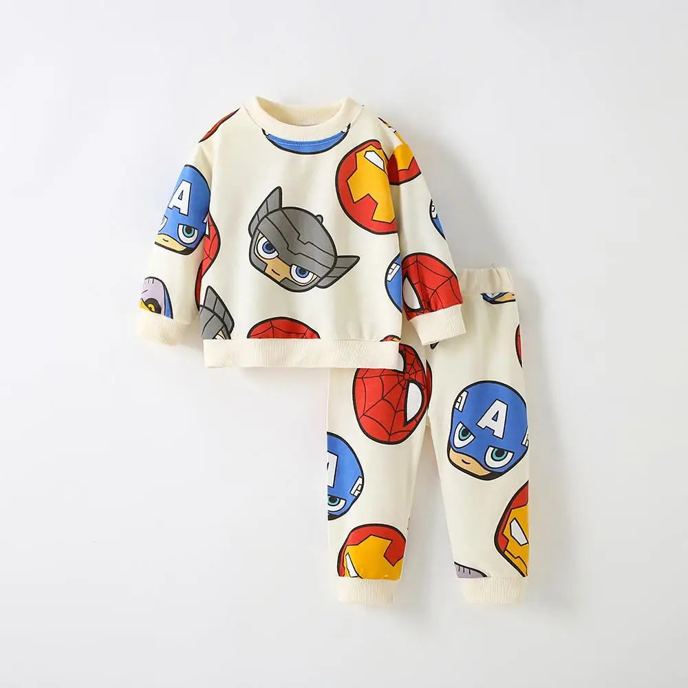 Children's pajama set with superhero logos on a white background