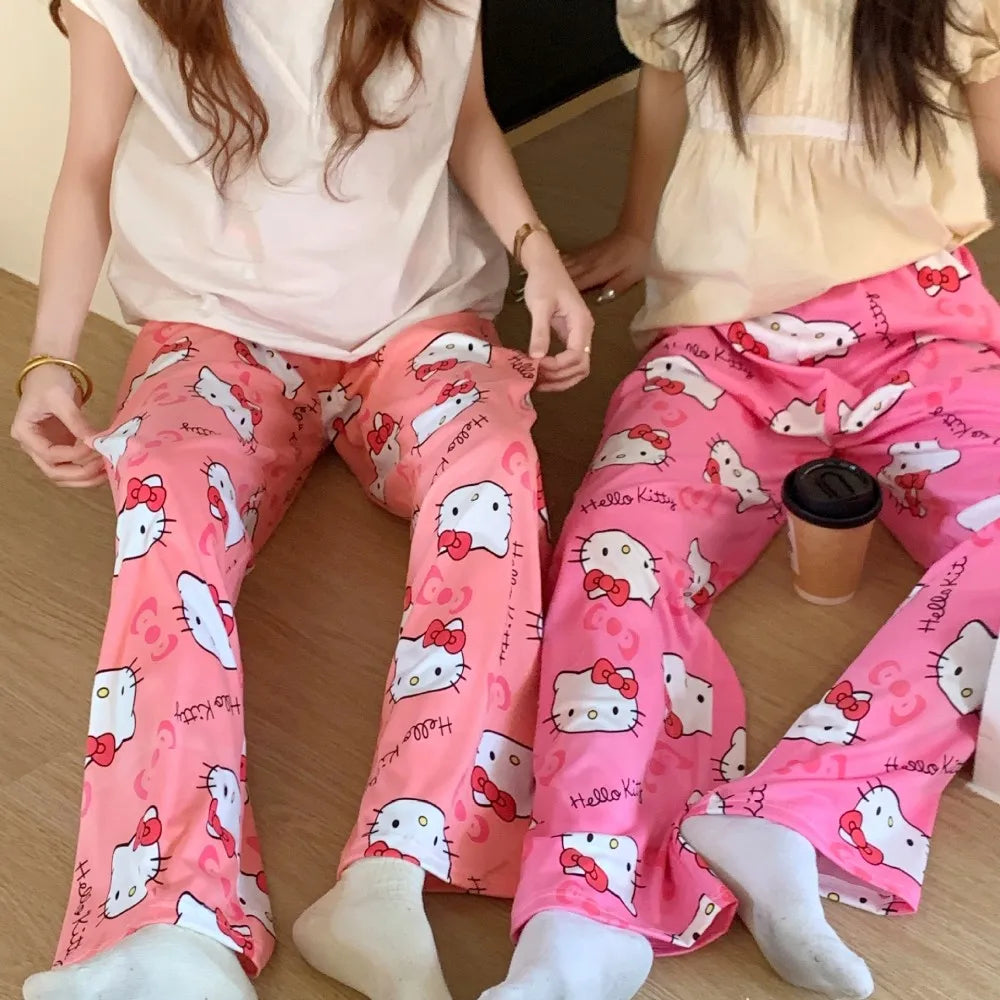 Hello Kitty women’s summer pajama pants with cute cartoon print, loose casual fit, perfect for lounging  pink. and red