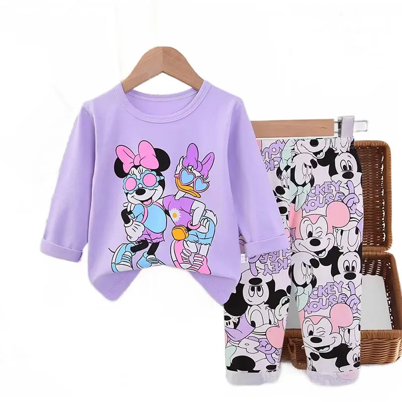 Children's pajama set with cartoon characters on a white background