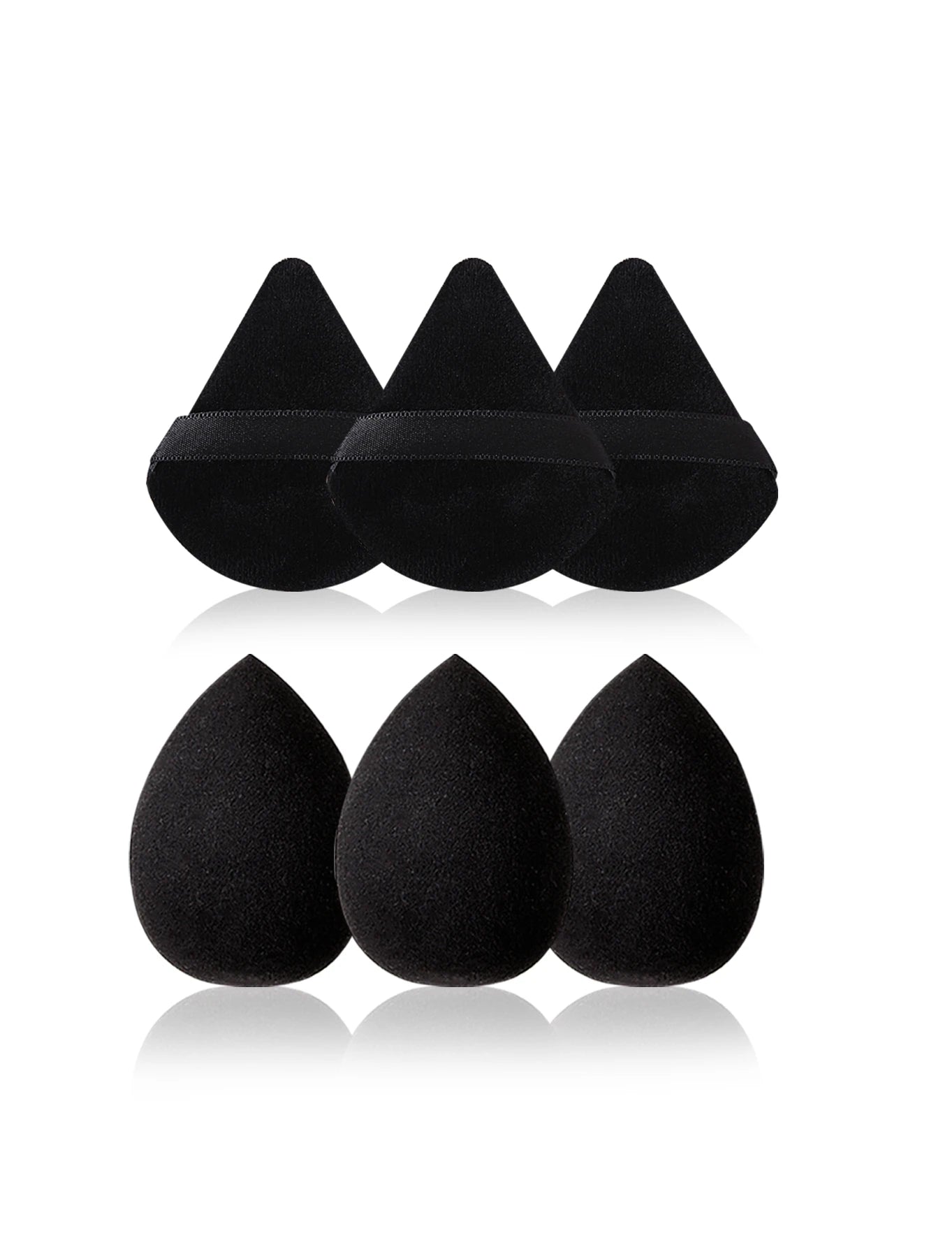 Set of black makeup sponges on a white background