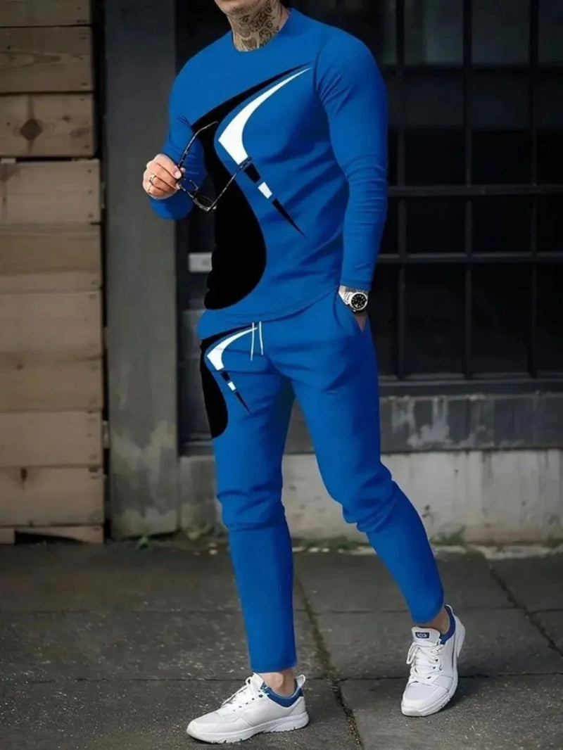 Person wearing a blue tracksuit with white accents outdoors.