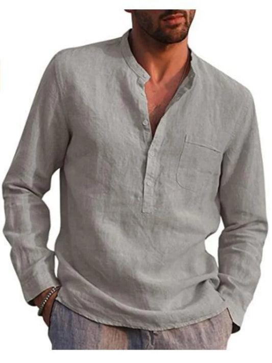 Man wearing a light gray long-sleeve shirt with a pocket on a white background