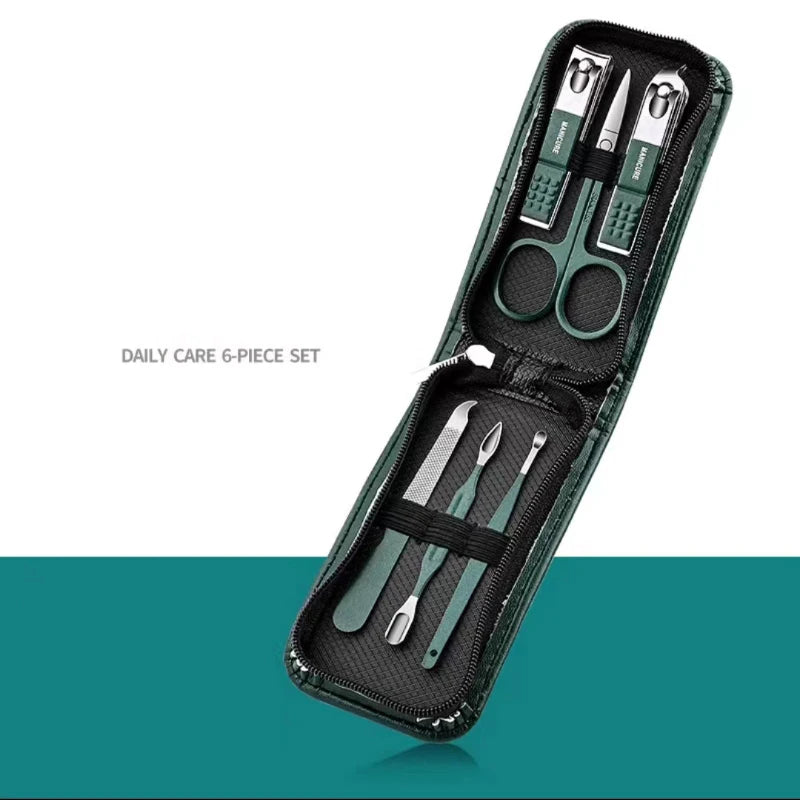 Manicure set with green case on a white and teal background