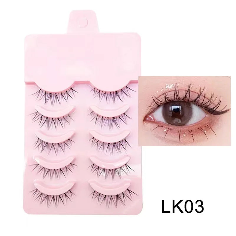 Set of false eyelashes in a pink case with an inset showing an eye wearing the lashes.