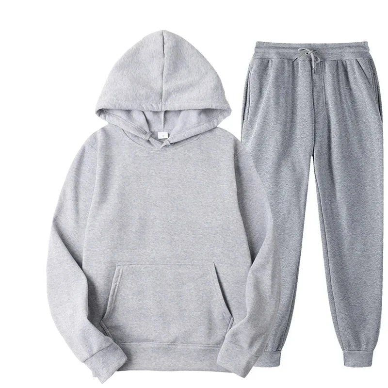 Gray hoodie and pants set on a white background