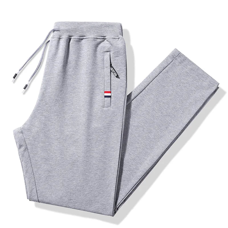 Gray sweatpants with a brand logo on a white background