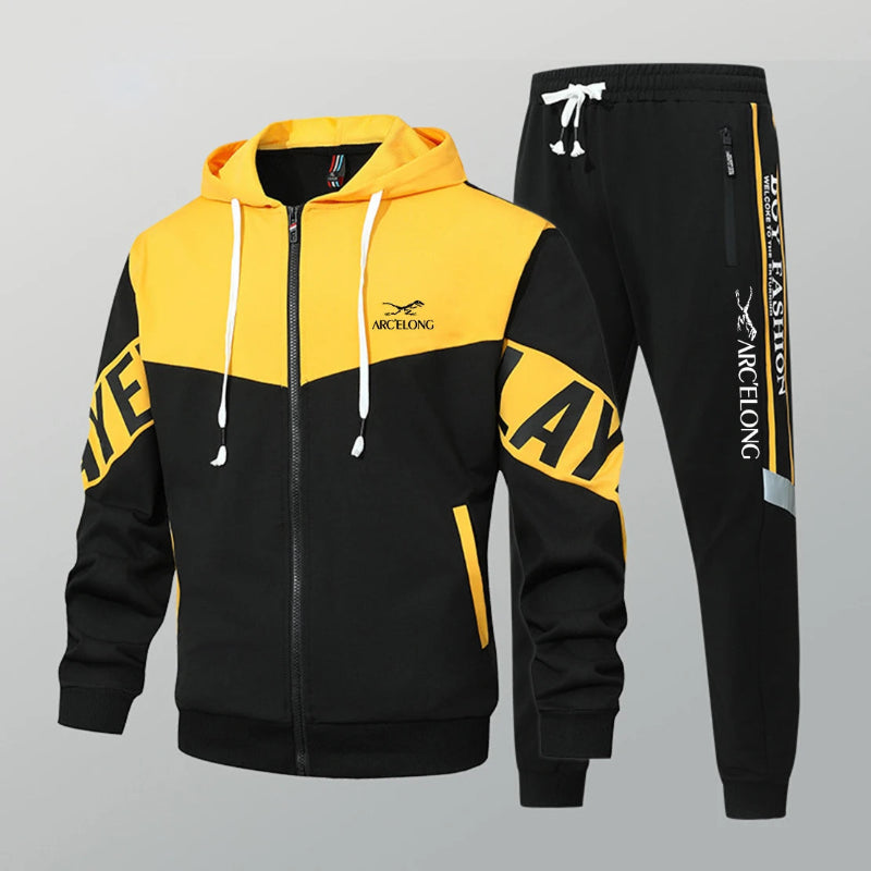 Black and yellow tracksuit with 'ARCELONG' branding on a gray background