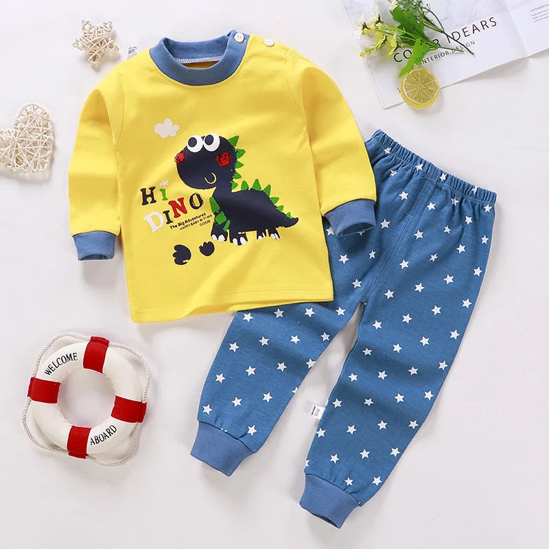 A baby girl's outfit set with long sleeves, featuring Minnie Mouse character designs, hanging on a wooden hanger.