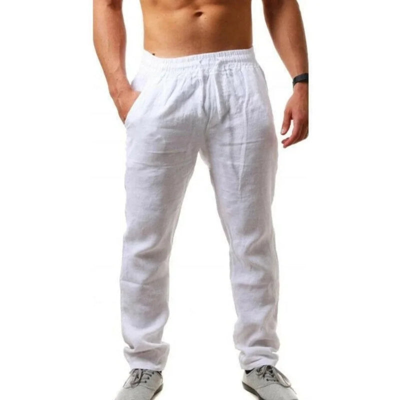 White pants worn by a person on a white background