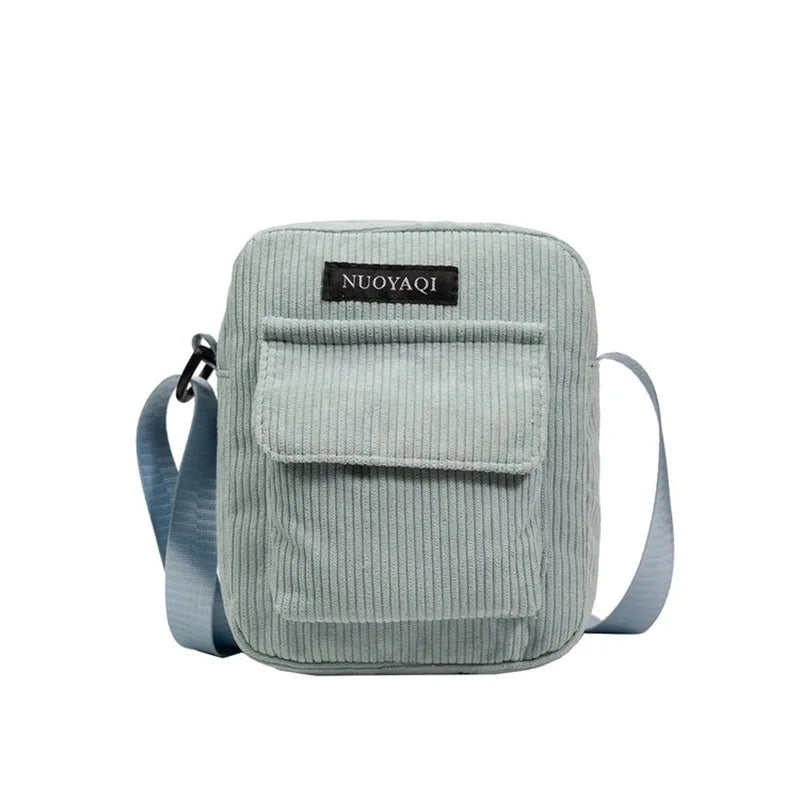 Striped corduroy fabric shoulder bag with zipper and crossbody strap, casual canvas tote for women green