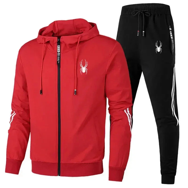 Red hoodie with black zipper and black pants with white spider logo on a white background